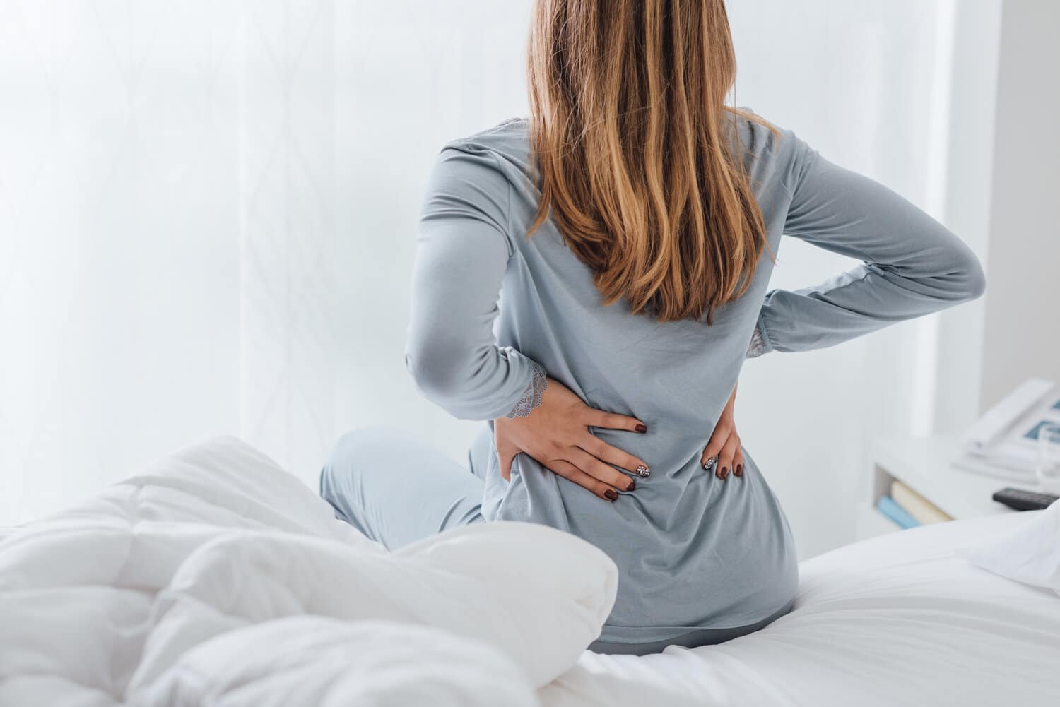 can a lumpy mattress cause back pain